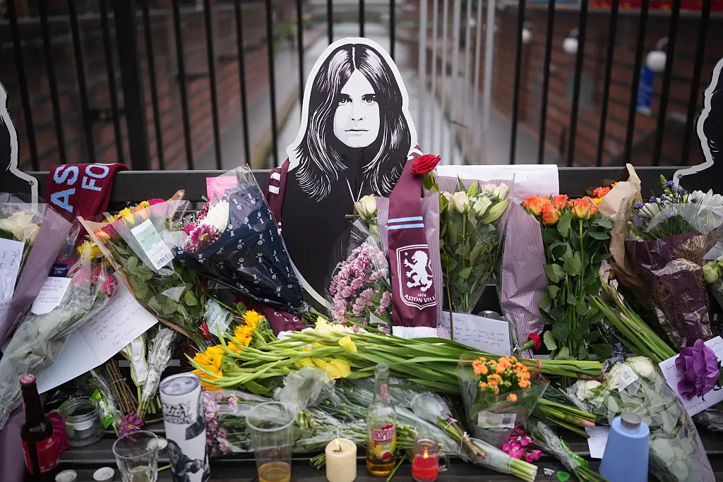 Tributes have been laid at the Black Sabbath Bridge in Birmingham, UK. Credit: Christopher Furlong / Getty