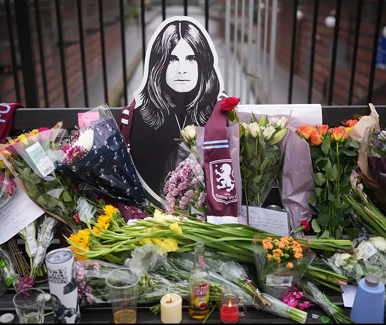 Tributes have been laid at the Black Sabbath Bridge in Birmingham, UK. Credit: Christopher Furlong / Getty