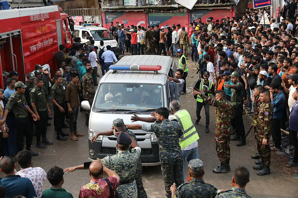 At least 19 dead after military aircraft crashes into school sparking explosion
