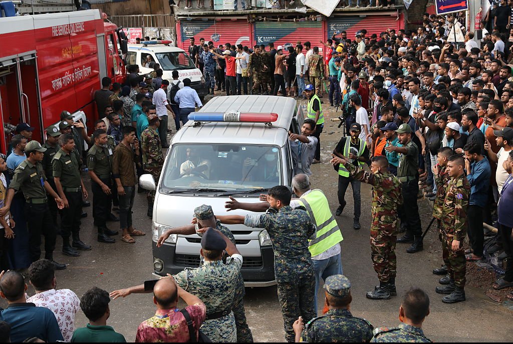 At least 19 dead after military aircraft crashes into school sparking explosion