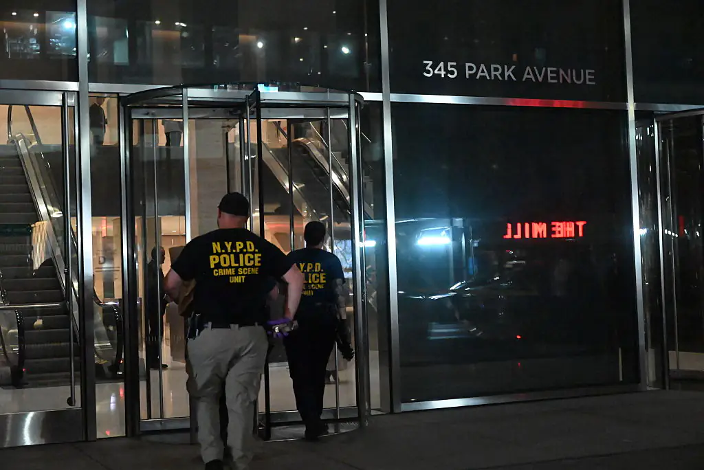Gunman found with note hinting at possible motive after killing four in New York office tower