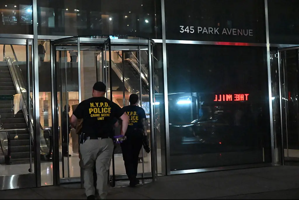 Gunman found with note hinting at possible motive after killing four in New York office tower