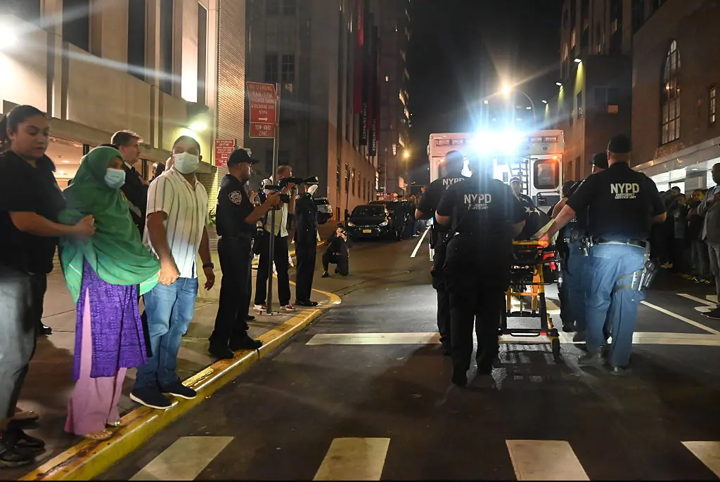 Gunman 'spared woman's life' during New York office shooting spree where he killed four people