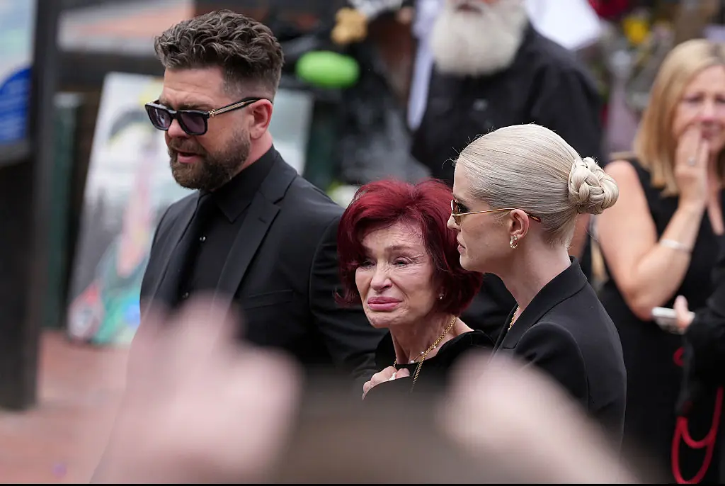 Jack at Ozzy's funeral with mom Sharon and sister Kelly. Credit: Christopher Furlong / Getty
