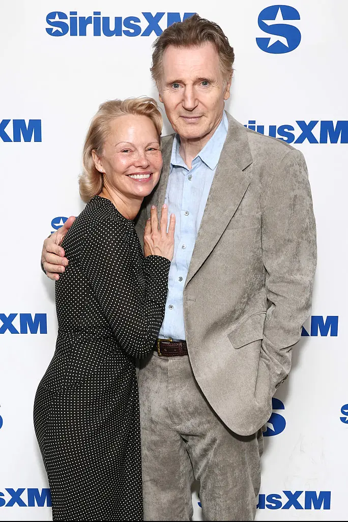 Pamela Anderson and Liam Neeson. Credit: Cindy Ord / Getty
