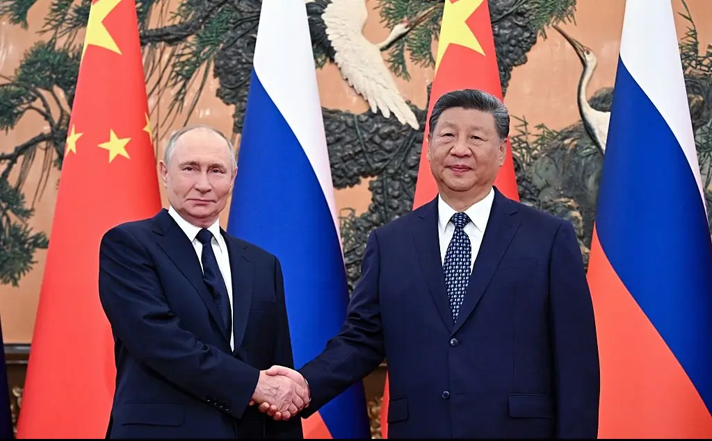 Hot mic picks up disturbing exchange between Vladimir Putin and Xi Jinping - it may show their intentions