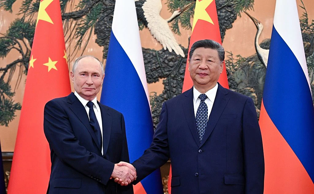 Hot mic picks up disturbing exchange between Vladimir Putin and Xi Jinping - it may show their intentions