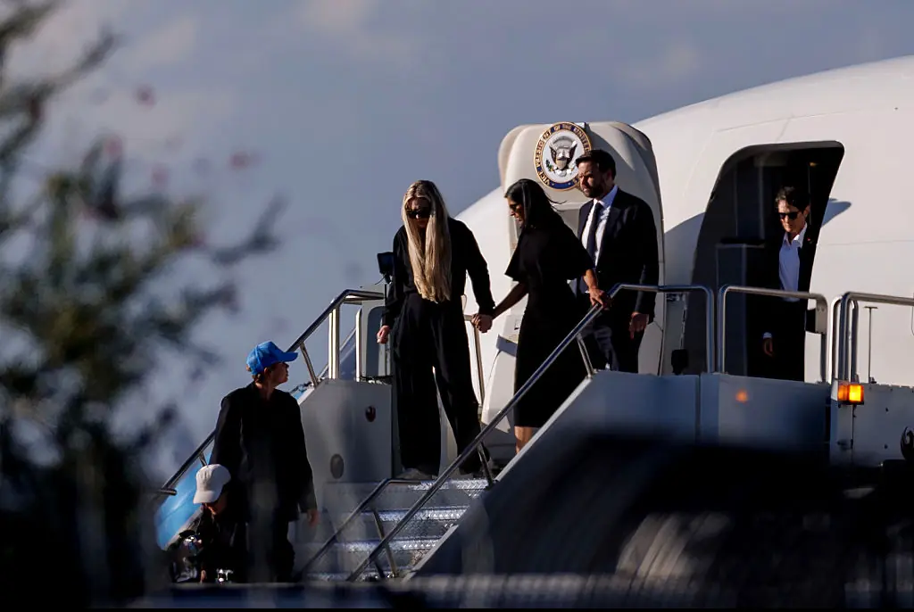 : Vice President JD Vance (R) second lady Usha Vance (C) and Erika Kirk deplane Air Force Two while escorting the body of Charlie Kirk. Credit: Eric Thayer / Getty