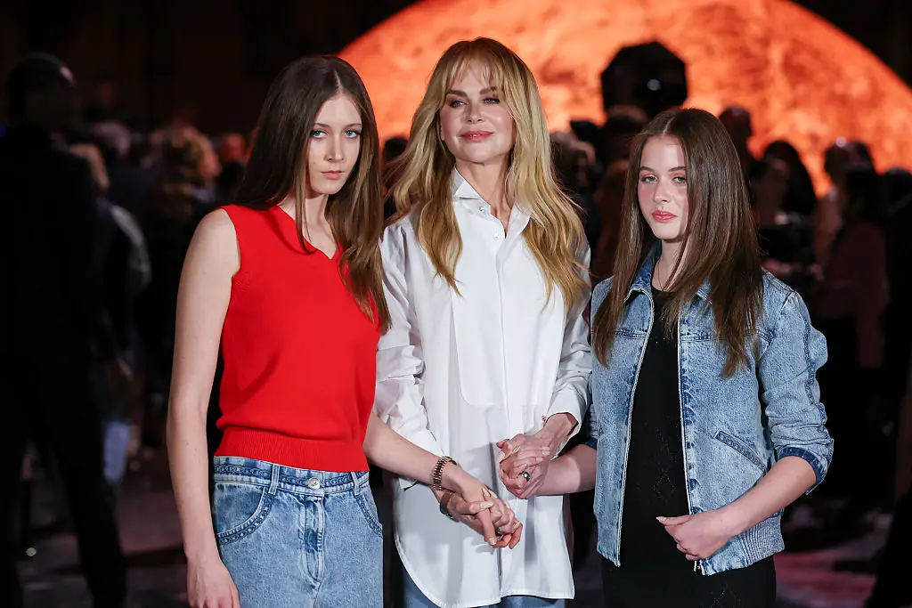 Nicole Kidman with daughters Sunday Rose and Faith Margaret at the Chanel Womenswear Spring/Summer 2026 show. Credit: Stephane Cardinale - Corbis / Getty Images.