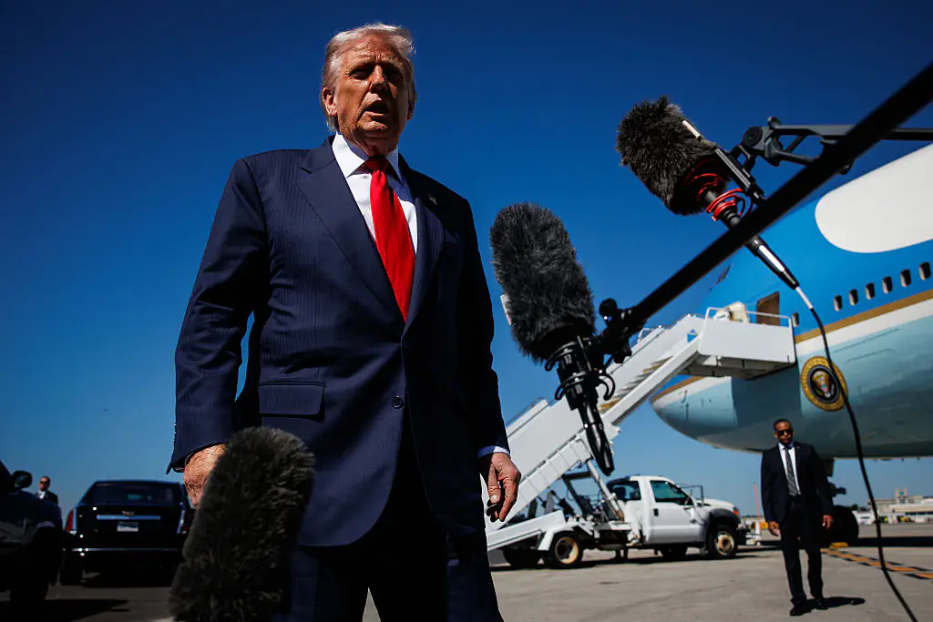 A small, rectangular shape was seen under Trump's suit jacket. Credit: Samuel Corum / Getty