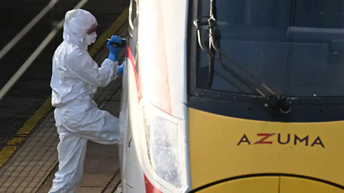 Multiple People Stabbed On Train In Cambridgeshire HUNTINGDON, ENGLAND - NOVEMBER 02: Forensic police officers examine the LNER train as it sits in Huntingdon Station after a stabbing attack on November 02, 2025 in Huntingdon, England. Yesterday evening, multiple people were injured in a knife attack on the 18:25 LNER service from Doncaster to London King's Cross, forcing the train to make an emergency stop in Huntingdon. Police said two people were arrested and the injured were taken to hospital. (Photo by Leon Neal/Getty Images)
