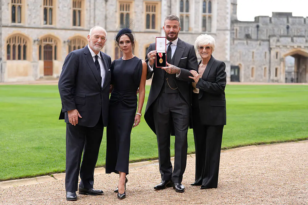 Sir David Beckham with his wife Lady Victoria and parents Ted and Sandra Beckham. Credit: Pool / Getty