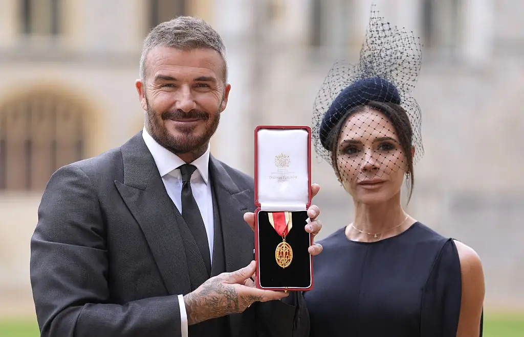 Sir David Beckham with his wife Lady Victoria after his knighthood. Credit: Pool / Getty
