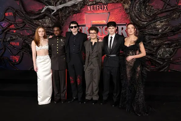 Sadie Sink, Caleb McLaughlin, Finn Wolfhard, Gaten Matarazzo, Noah Schnapp and Millie Bobby Brown at the LA Premiere of Stranger Things Season 5. Credit: Kevin Winter/Getty Images.