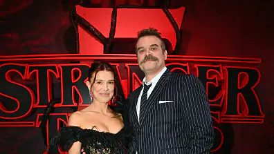 HOLLYWOOD, CALIFORNIA - NOVEMBER 06: (L-R) Millie Bobby Brown and David Harbour attend Netflix's "Stranger Things" Season 5 World Premiere at TCL Chinese 6 Theatres on November 06, 2025 in Hollywood, California. (Photo by Jerod Harris/Getty Images for Netflix)
