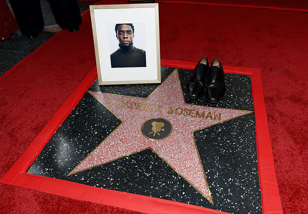 Boseman's portrait and a pair of his shoes were seen on the star. Credit: Matt Winkelmeyer/Getty Images