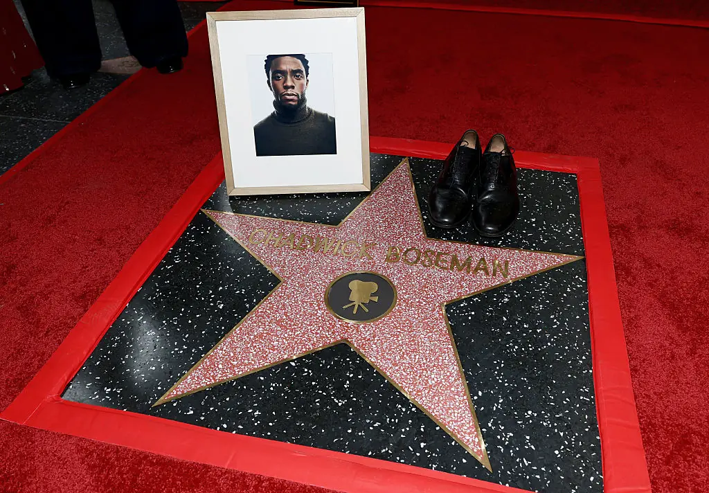 Boseman's portrait and a pair of his shoes were seen on the star. Credit: Matt Winkelmeyer/Getty Images