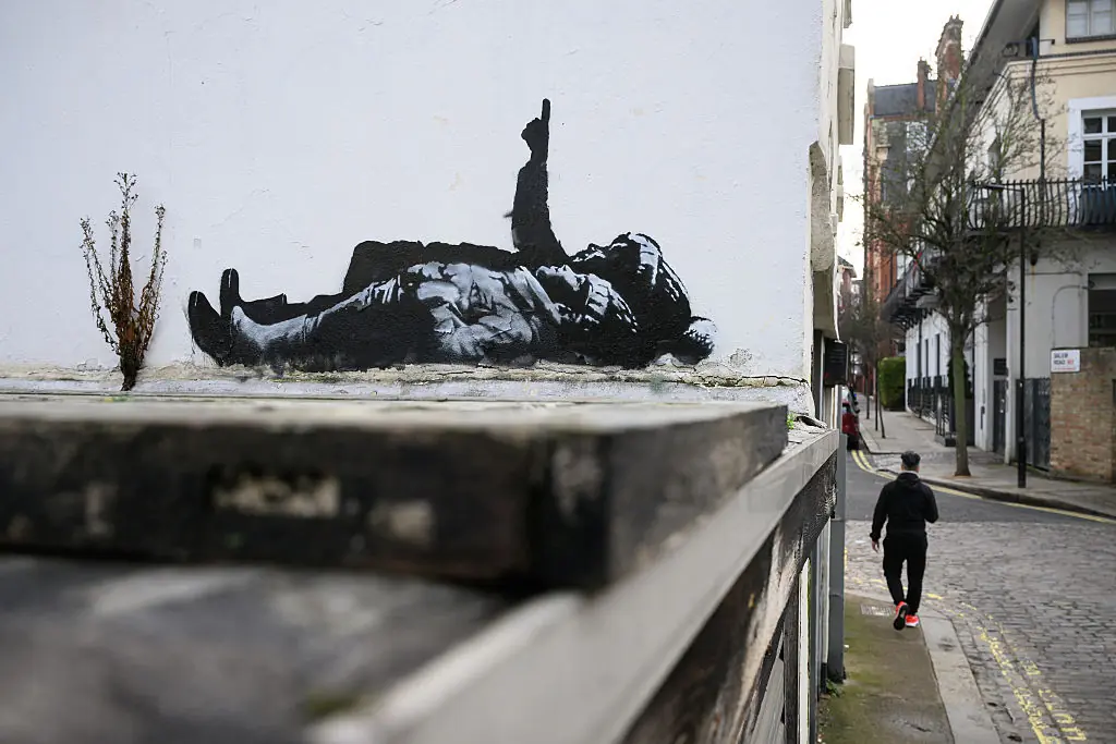 Banksy's identity has remained a mystery for decades. Credit: Leon Neal / Getty