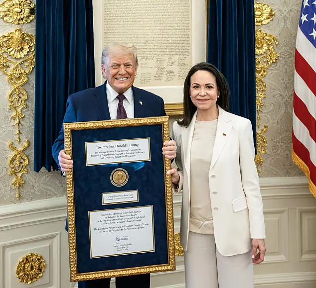 Machado presented the award to Trump. Credit:  Daniel Torok/The White House via Getty Images