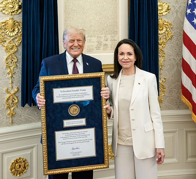 Machado presented the award to Trump. Credit:  Daniel Torok/The White House via Getty Images