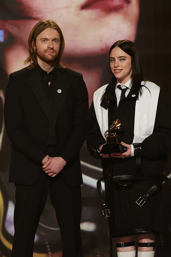 Finneas O'Connell and Billie Eilish wearing 