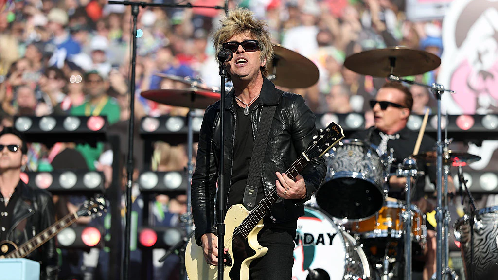 Green Day perform at Super Bowl LX. Credit: Ronald Martinez