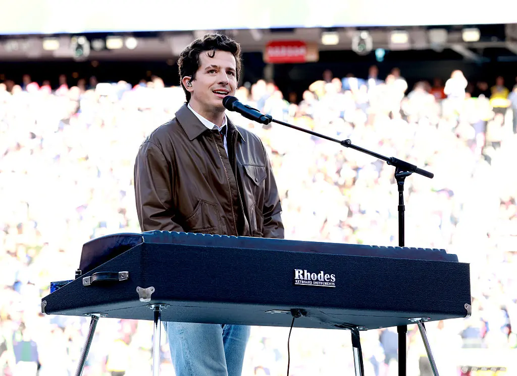 Charlie Puth performing at Super Bowl LX. Credit: Kevin Mazur/Getty