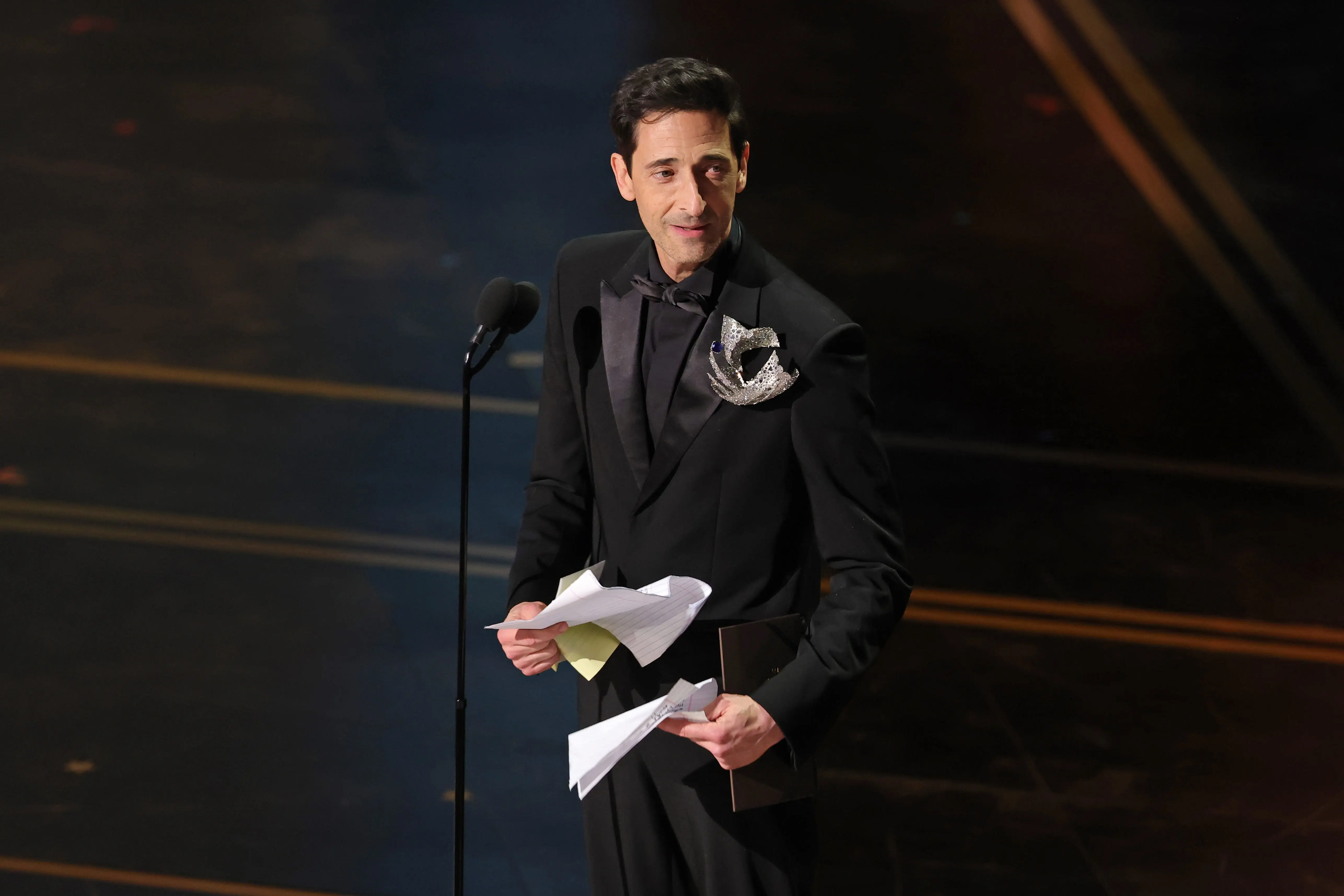 Adrien Brody presents Best Actor at Academy Awards. Credit: Kevin Winter/Getty Images