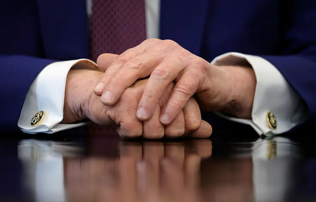 Online users said Trump was covering his hands during his June 3rd appearance. Credit:	Kevin Dietsch / Getty