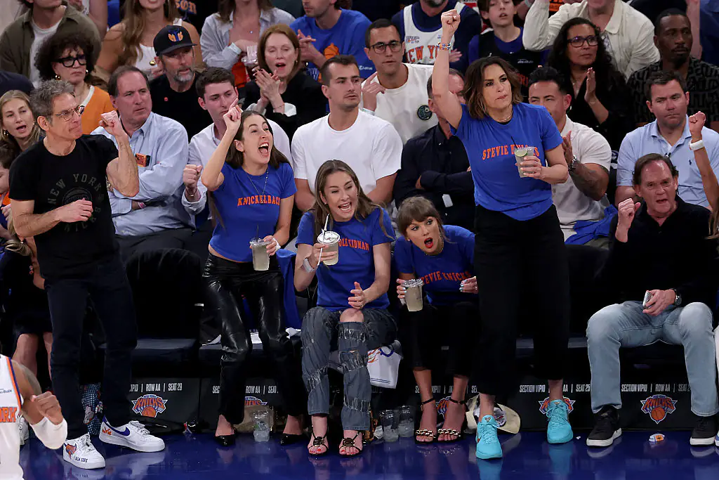 Alana Haim, Este Haim, Taylor Swift, and Mariska Hargitay attend Game Four of the 2026 NBA Finals. Credit: Al Bello / Getty
