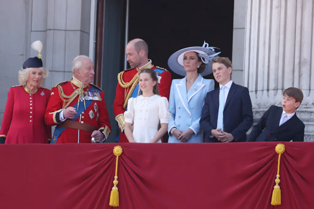 The Royal family looked smart as they waved to crowds from the balcony. Credit: Neil Mockford/Getty Images