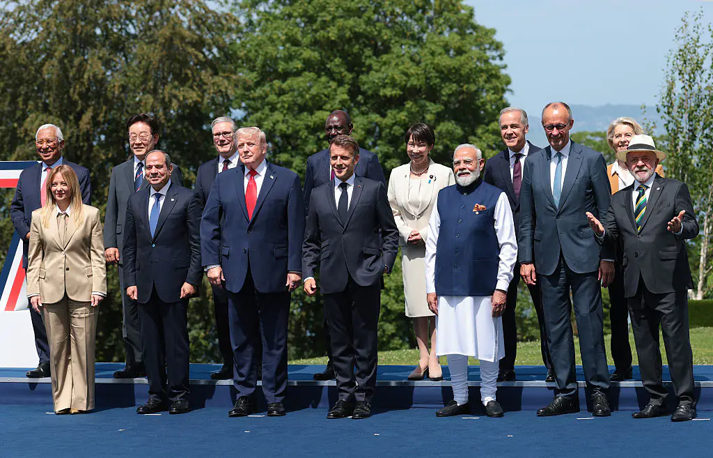 Trump with several world leaders, including Macron at the G7 Summit. Credit: Anna Moneymaker / Getty Images