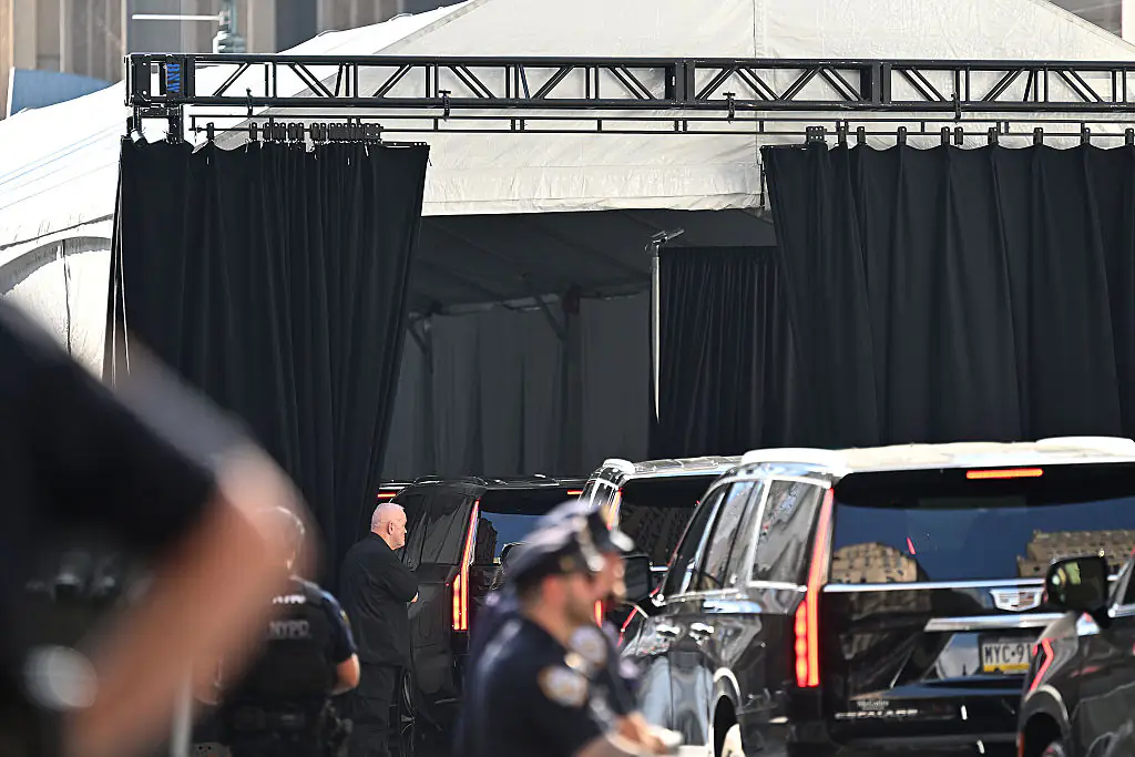 Several blacked-out SUVs could be seen in the area, with one believed to be carrying bride Taylor Swift. Credit: Roy Rochlin/Getty Images