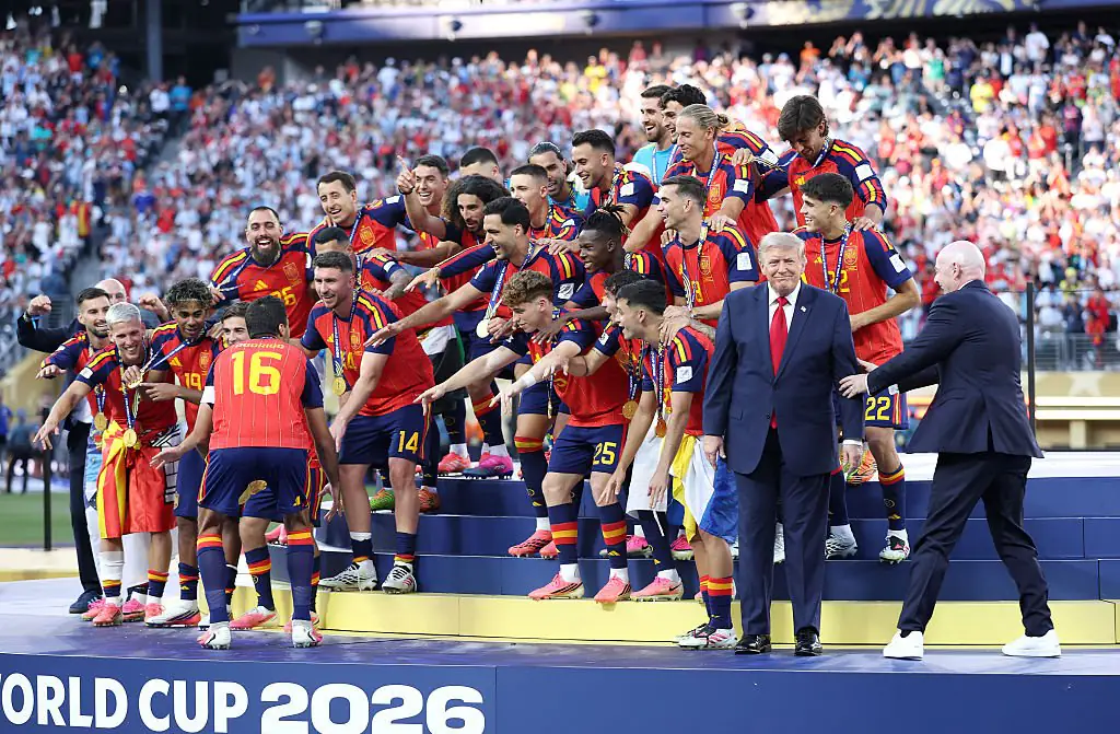 The ceremony became awkward after Trump remained on stage while the Spanish players prepared for their trophy lift. Credit: Dan Mullan / Getty