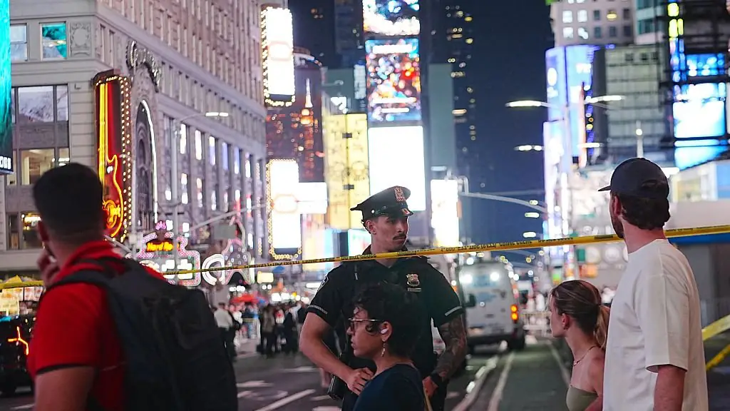 NEW YORK, UNITED STATES - AUGUST 31: New York Police Department (NYPD) officers investigate the scene after police reportedly shot and wounded a knife-wielding woman accused of stabbing two people near West 42nd Street and Seventh Avenue in Times Square, Manhattan, New York, United States, on August 31, 2026. According to law enforcement sources, the woman allegedly stabbed a man and a woman at West 42nd Street and Seventh Avenue, in the area known as the Crossroads of the World, just before 4:30 p.m. before NYPD officers shot and wounded her. The suspect and both stabbing victims were hospitalized in critical condition. Several knives were recovered at the scene. The NYPD investigation remains ongoing and active at this time. (Photo by Selcuk Acar/Anadolu via Getty Images)