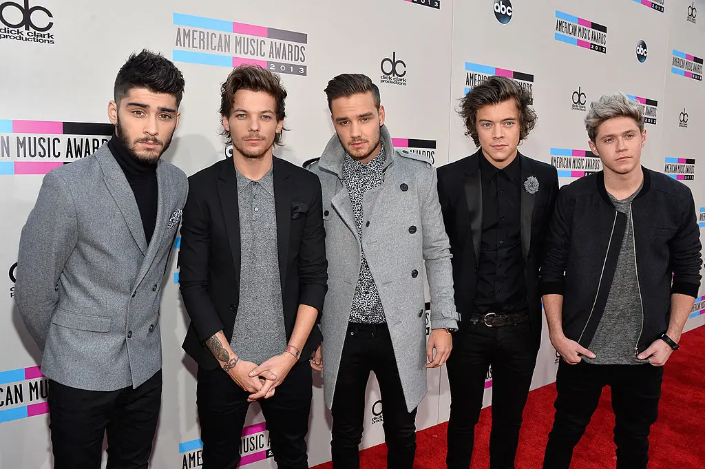 Payne was in One Direction alongisde Zayn Malik, Louis Tomlinson, Nial Horan, and Harry Styles. Credit: Frazer Harrison/AMA2013 / Getty