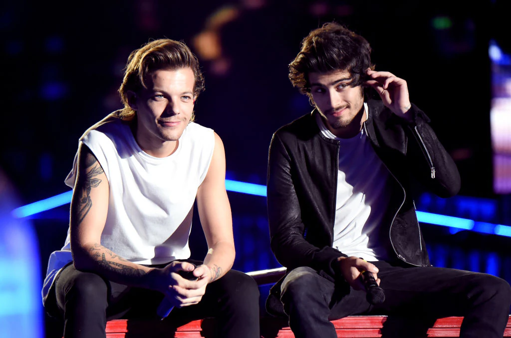 Louis Tomlinson and Zayn Malik were going to feature in a Netflix documentary. Credit: Jeff Kravitz/OneD / Getty
