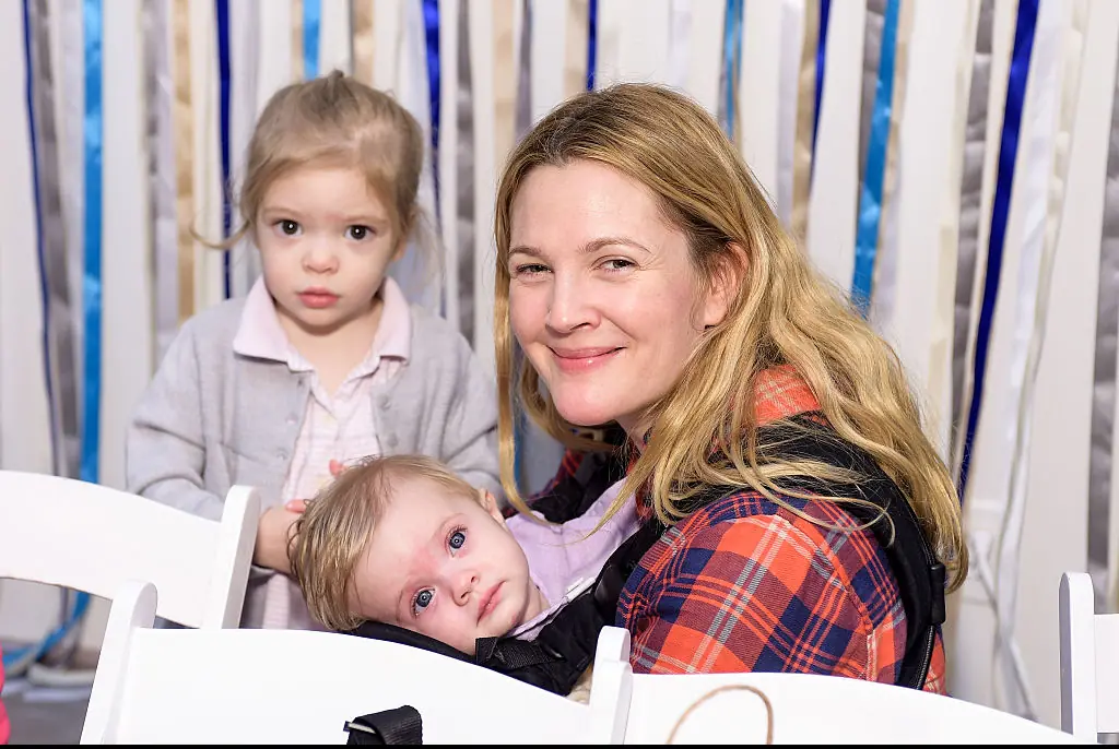 Drew has two kids, Olive and Frankie, pictured in 2014. Credit: Stefanie Keenan/Getty Images for Baby2Baby