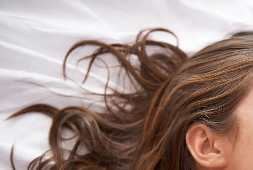 How many times a couple gets between the sheets can vary greatly. Credit: PeopleImages/Getty Images
