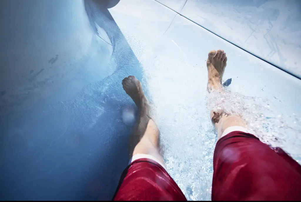 Female diver ignores warnings over men-only waterslide - goes down anyway