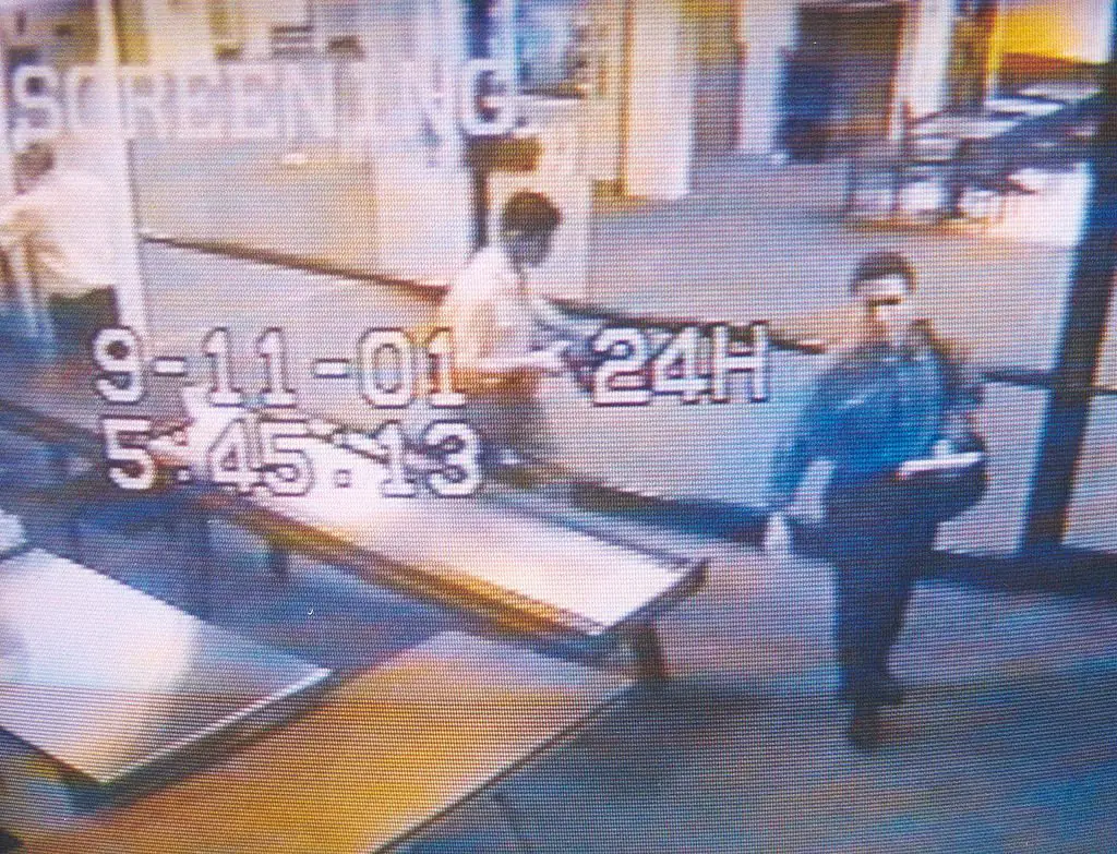 Michael Tuohey had checked in Mohammed Atta (right) And Abdulaziz Alomari (centre) before the fateful flight. Credit: U.S. Navy/Getty Images