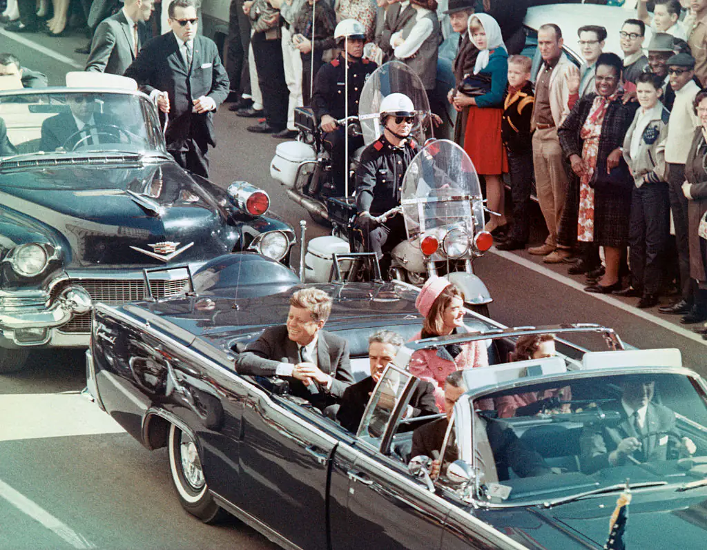 John F. Kennedy pictured in his motorcade moments before he was fatally shot. Credit: Bettmann /Getty Images 