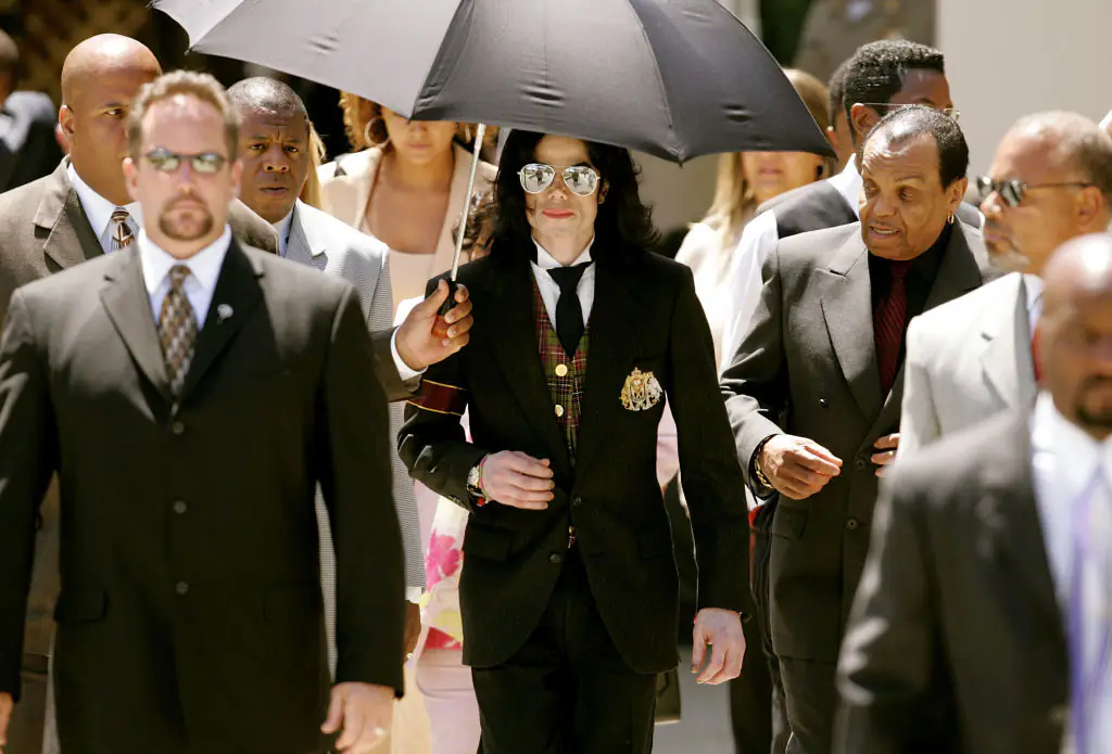Michael Jackson leaving the courthouse after his child molestation trial in 2005. Credit: Carlo Allegri / Getty
