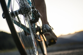 Cyclist crushed to death by large speaker moments before crossing finish line during race