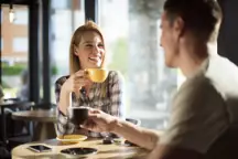 A man and a woman on a coffee date.