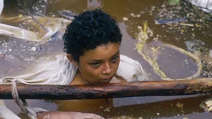 Reason photographer who took haunting picture of young girl with black eyes trapped in volcanic mudflow didn't try and save her