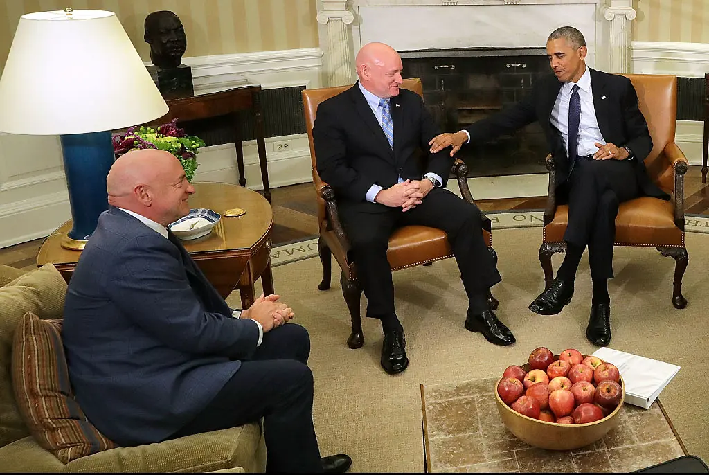 NASA astronauts Scott Kelly and his twin brother Mark Kelly met President Barack Obama.Credit:	Chip Somodevilla / Getty