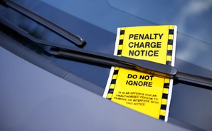 Woman furious after being hit with a $283 fine for parking in her own driveway
