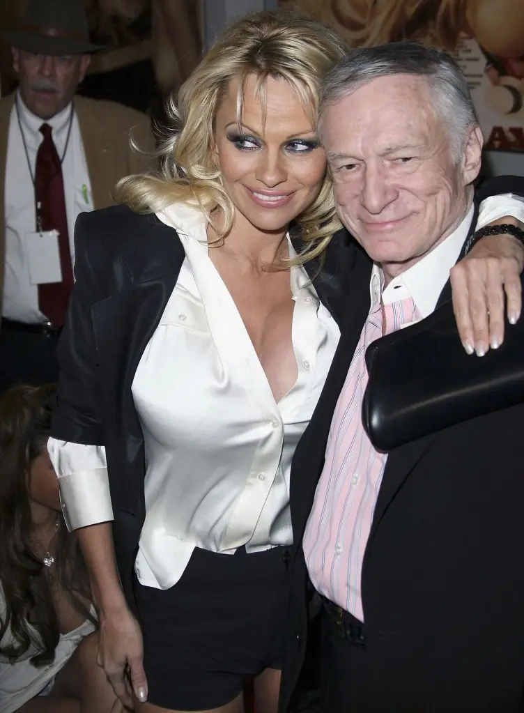 Pamela Anderson and Hugh Hefner had a long history together. Credit: Chad Buchanan / Getty Images.