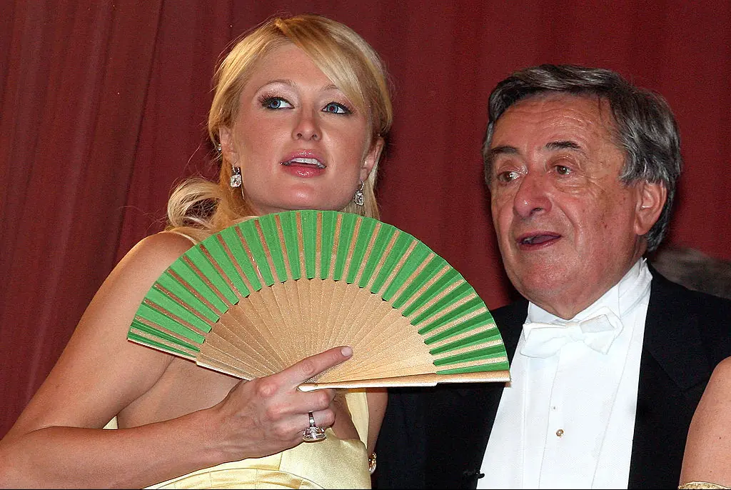 Paris Hilton and her host Richard Lugner chat during the Vienna Opera Ball on February 15, 2007.Credit: Johannes Simon / Getty